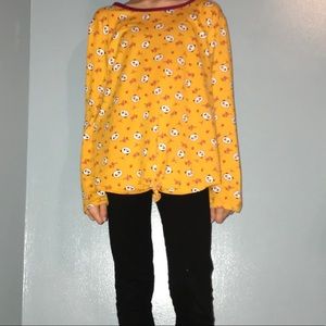yellow shirt with pandas on it